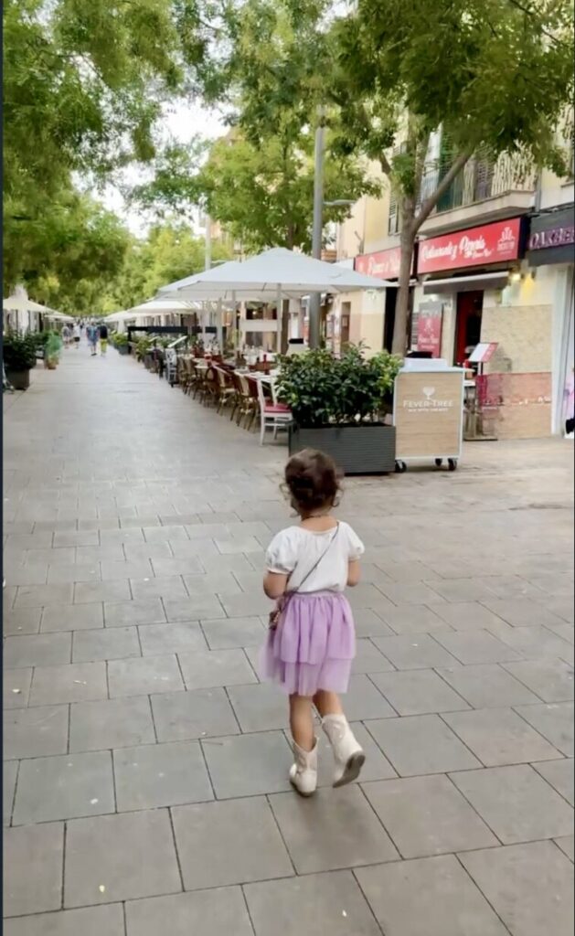 Coco walking through the streets of Palma