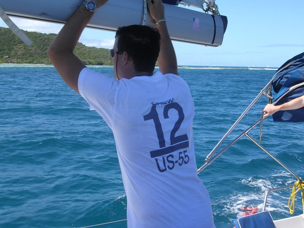 The back of a crew t-shirt reading Crew 12, US-55
