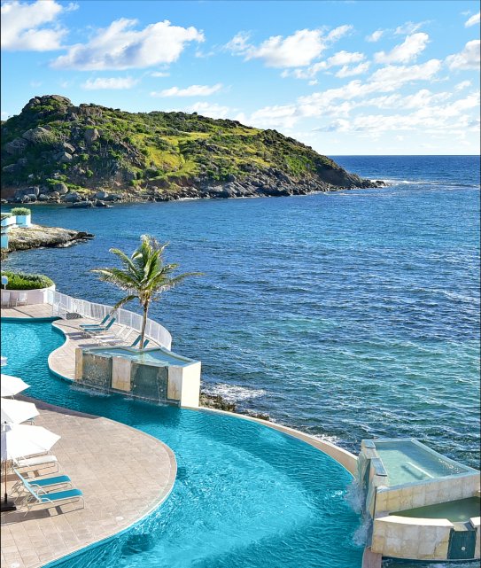 The infinity pool at Oyster Bay Beach Resort overlooking the reef and Oyster Pond, Sint Maarten.